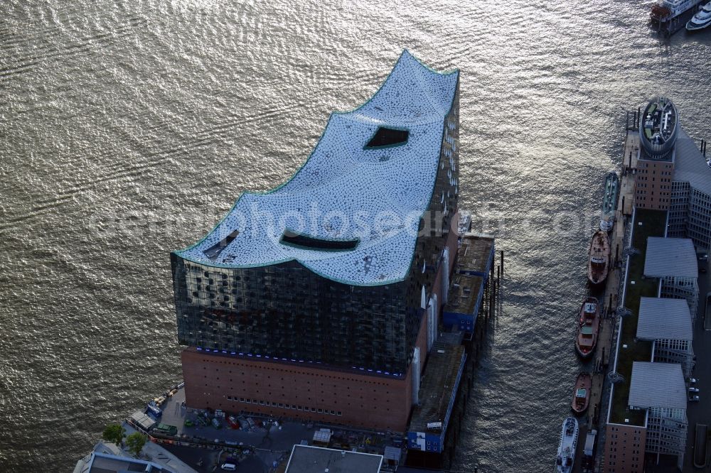 Hamburg from the bird's eye view: The Elbe Philharmonic Hall on the river bank of the Elbe in Hamburg. The building in the district HafenCity is still in process of construction