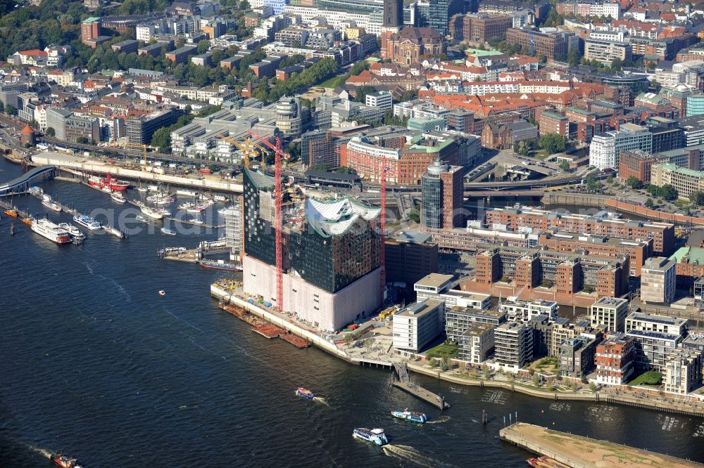 Aerial photograph Hamburg - The Elbe Philharmonic Hall on the river bank of the Elbe in Hamburg. The building in the district HafenCity is still in process of construction