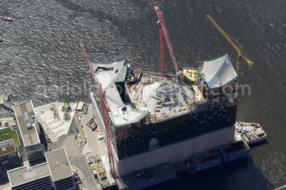 Aerial image Hamburg - The Elbe Philharmonic Hall on the river bank of the Elbe in Hamburg. The building in the district HafenCity is still in process of construction