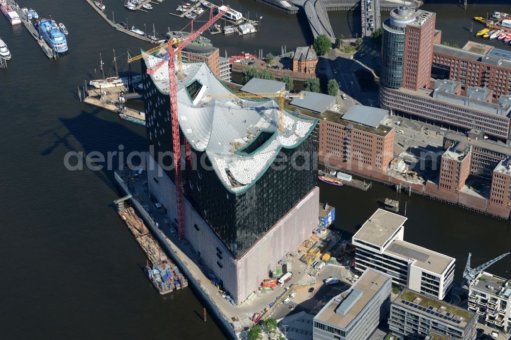 Hamburg from the bird's eye view: The Elbe Philharmonic Hall on the river bank of the Elbe in Hamburg. The building in the district HafenCity is still in process of construction