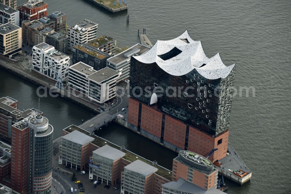 Aerial photograph Hamburg - The Elbe Philharmonic Hall on the river bank of the Elbe in Hamburg. The building in the district HafenCity is still in process of construction