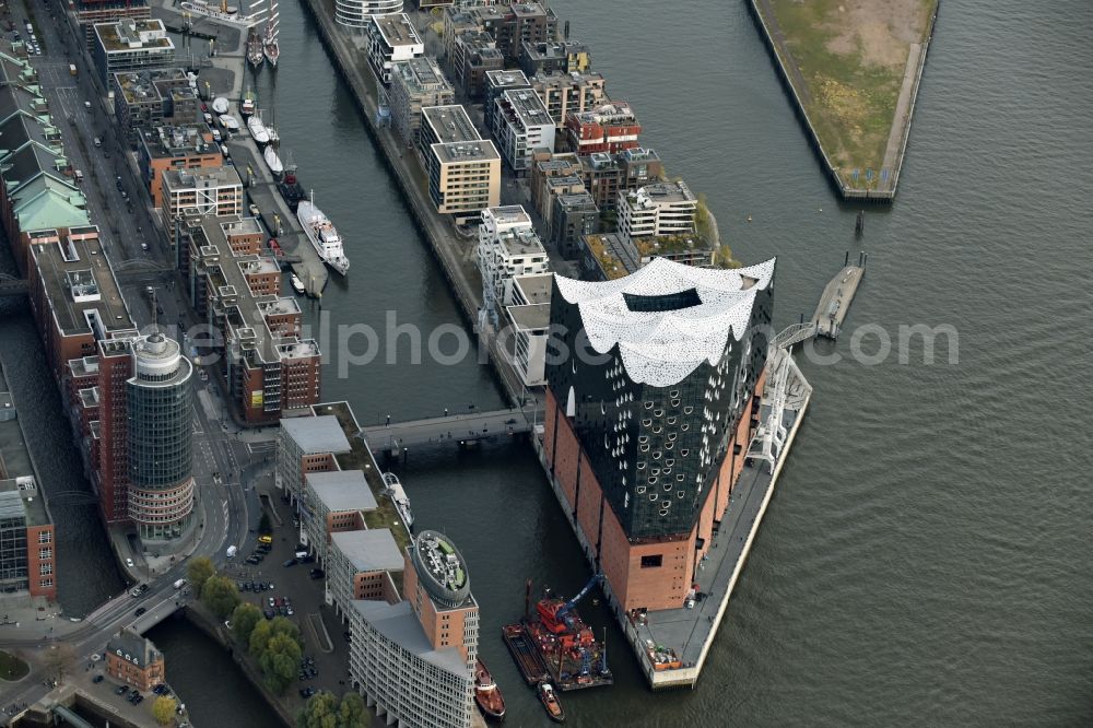 Hamburg from the bird's eye view: The Elbe Philharmonic Hall on the river bank of the Elbe in Hamburg. The building in the district HafenCity is still in process of construction