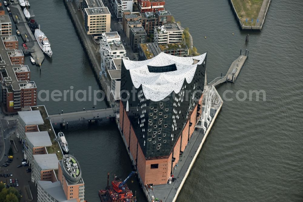 Aerial image Hamburg - The Elbe Philharmonic Hall on the river bank of the Elbe in Hamburg. The building in the district HafenCity is still in process of construction