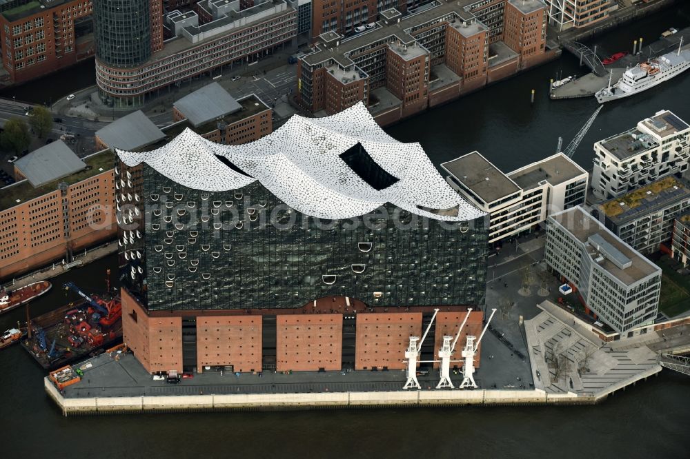 Hamburg from the bird's eye view: The Elbe Philharmonic Hall on the river bank of the Elbe in Hamburg. The building in the district HafenCity is still in process of construction