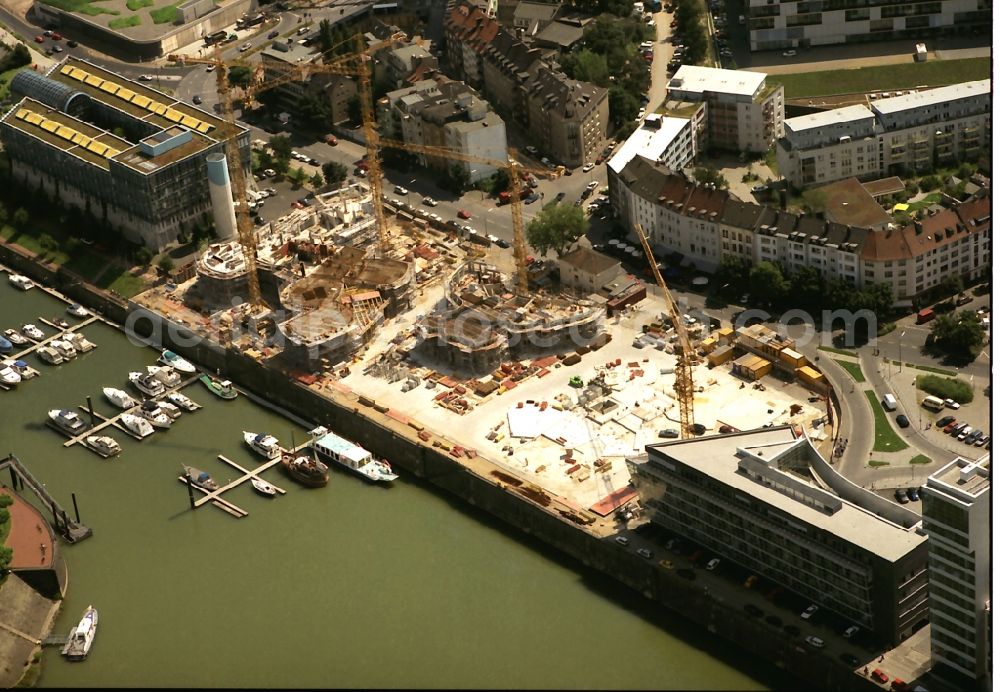 Düsseldorf from above - Construction site Office building Neuer Zollhof on Medienhafen on Ufer of Rhein in Duesseldorf in the state North Rhine-Westphalia, Germany. The Neuer Zollhof is a building ensemble in the Duesseldorf Media Harbor