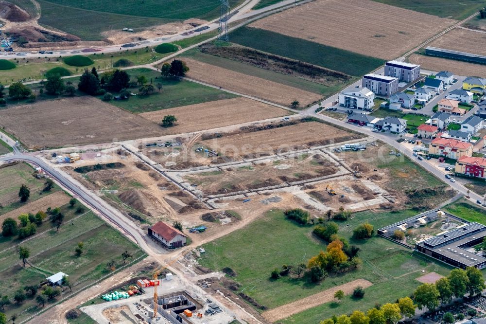 Aerial photograph Rust - Construction site with development works and embankments works Wohnbaugebiet in Rust in the state Baden-Wurttemberg, Germany