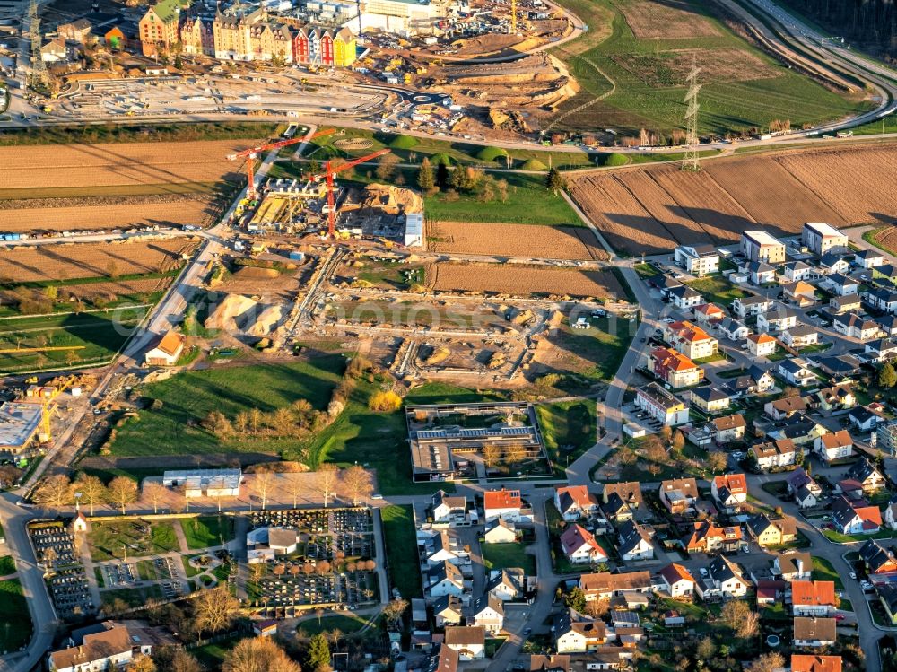 Aerial image Rust - Construction site with development works and embankments works fuer Baugebiet in Rust in the state Baden-Wurttemberg, Germany