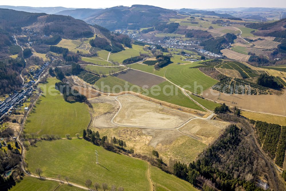 Bestwig from the bird's eye view: Construction site with development works and embankments works in the district Andreasberg in Bestwig at Sauerland in the state North Rhine-Westphalia, Germany