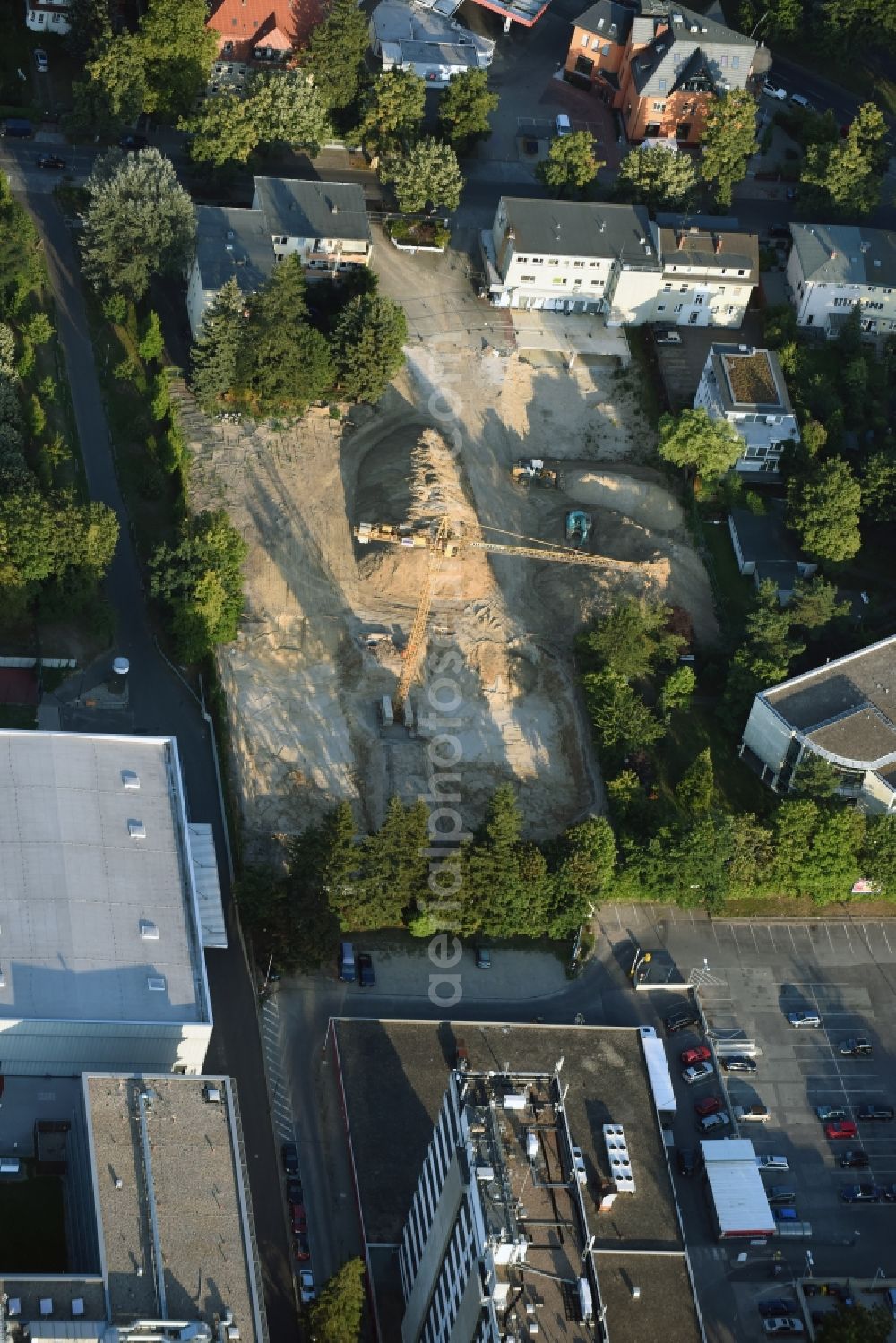 Berlin from the bird's eye view: Construction site with development works and embankments works in the Charlottenburger Street in Berlin