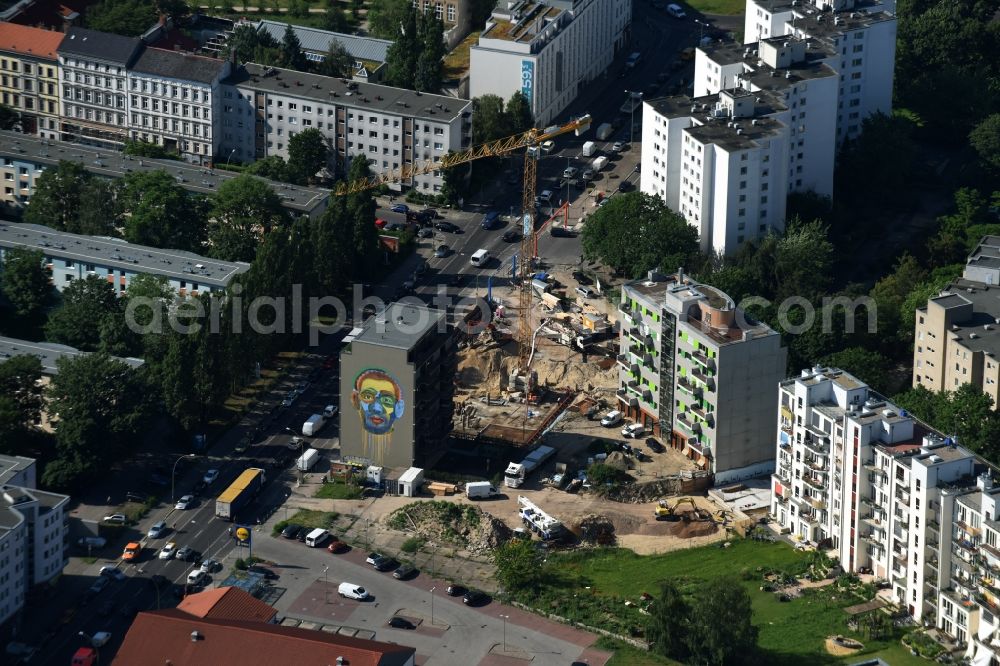 Berlin from the bird's eye view: Construction site with development works and embankments works of Conex GmbH in the Heinrich Heine street in Berlin