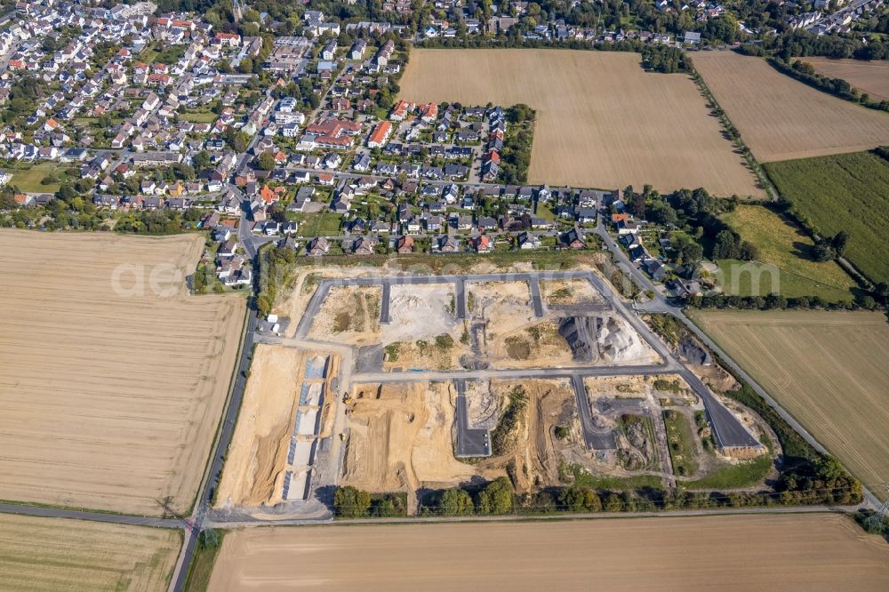 Aerial image Holzwickede - Construction site with development works and embankments works at the new residential park Emscherquelle on the site of the former Emscher barracks in Holzwickede in the state North Rhine-Westphalia, Germany