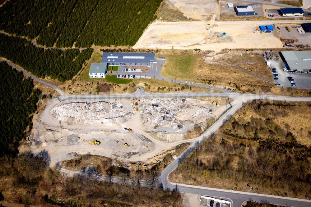 Schmallenberg from the bird's eye view: Construction site with development works and embankments works on Eschenweg - Fichtenweg in Schmallenberg at Sauerland in the state North Rhine-Westphalia, Germany