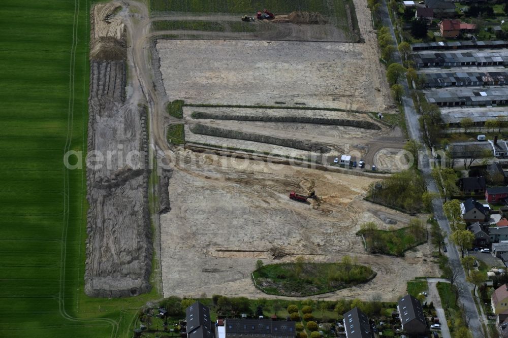 Rüdersdorf from the bird's eye view: Construction site with development works and embankments works on Gruenheider Weg in Ruedersdorf in the state Brandenburg