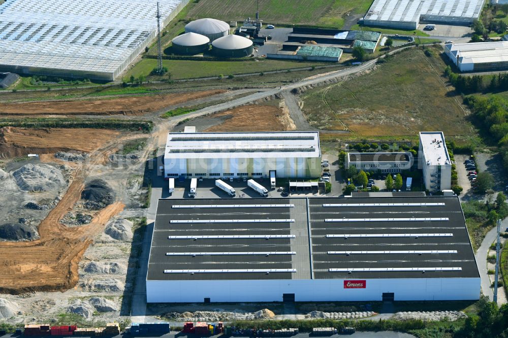 Thiendorf from the bird's eye view: Construction site with development works and embankments works in the commercial area on street Am Fiebig in Thiendorf in the state Saxony, Germany