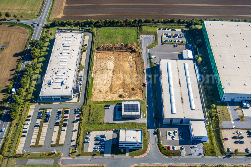 Aerial photograph Unna - Construction site with development works and embankments works in the commercial area on street Isaac-Newton-Strasse - Lise-Meitner-Strasse in the district Industriepark Unna in Unna at Ruhrgebiet in the state North Rhine-Westphalia, Germany