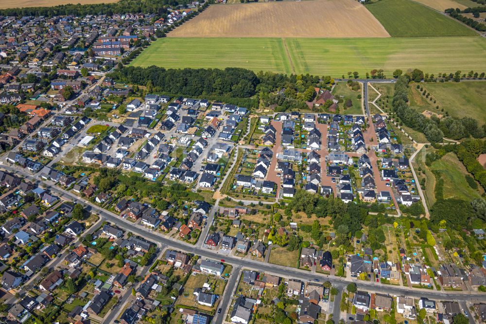 Aerial photograph Hamm - Construction site with development works and embankments works fuer den Neubau einer Einfamilienhaussiedlung in Hamm in the state North Rhine-Westphalia, Germany