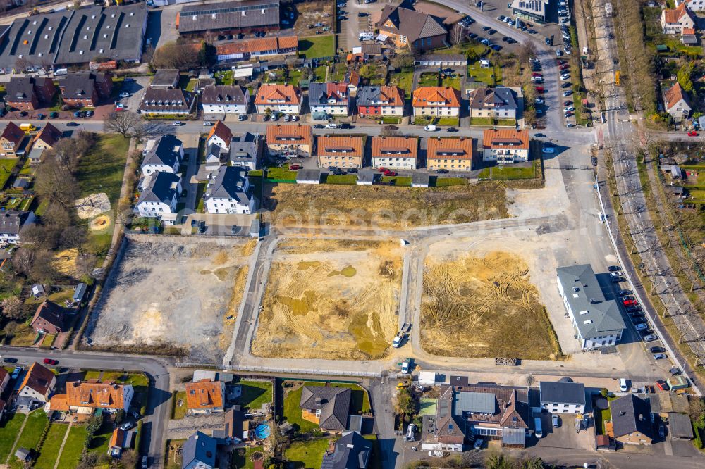 Soest from above - Construction site with development works and embankments works for a new residential area on the former Coca-Cola premises on street Briloner Strasse in Soest in the state North Rhine-Westphalia, Germany