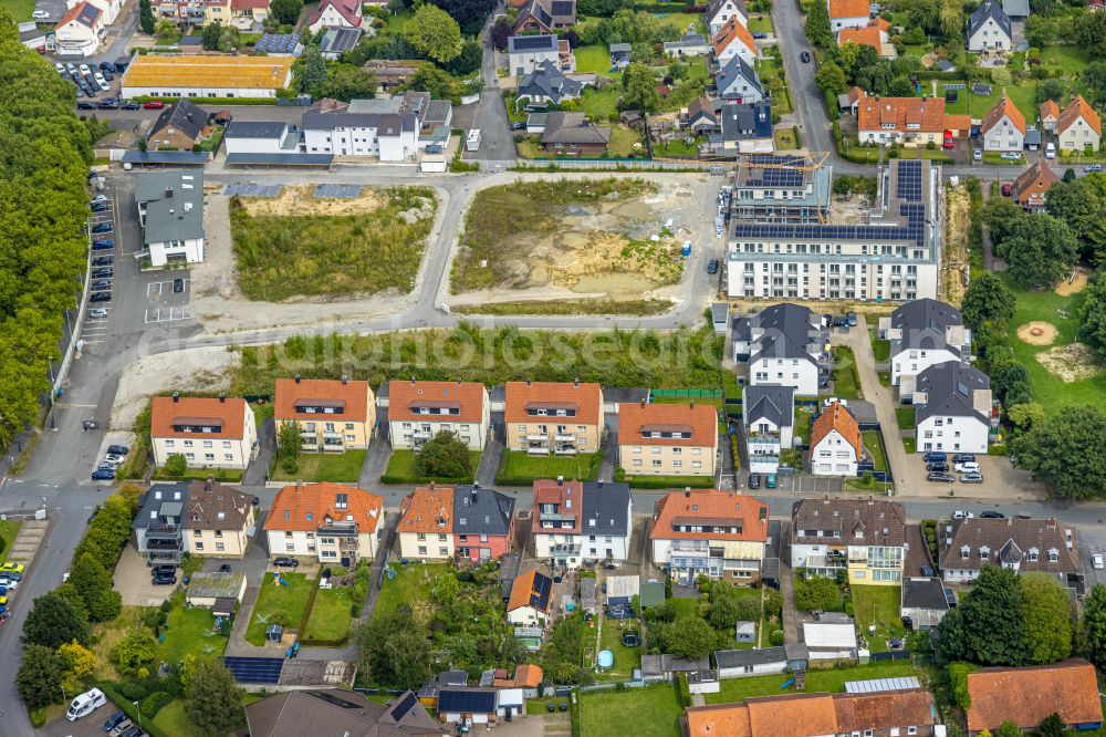 Aerial photograph Soest - Construction site with development works and embankments works for a new residential area on the former Coca-Cola premises on street Briloner Strasse in Soest in the state North Rhine-Westphalia, Germany