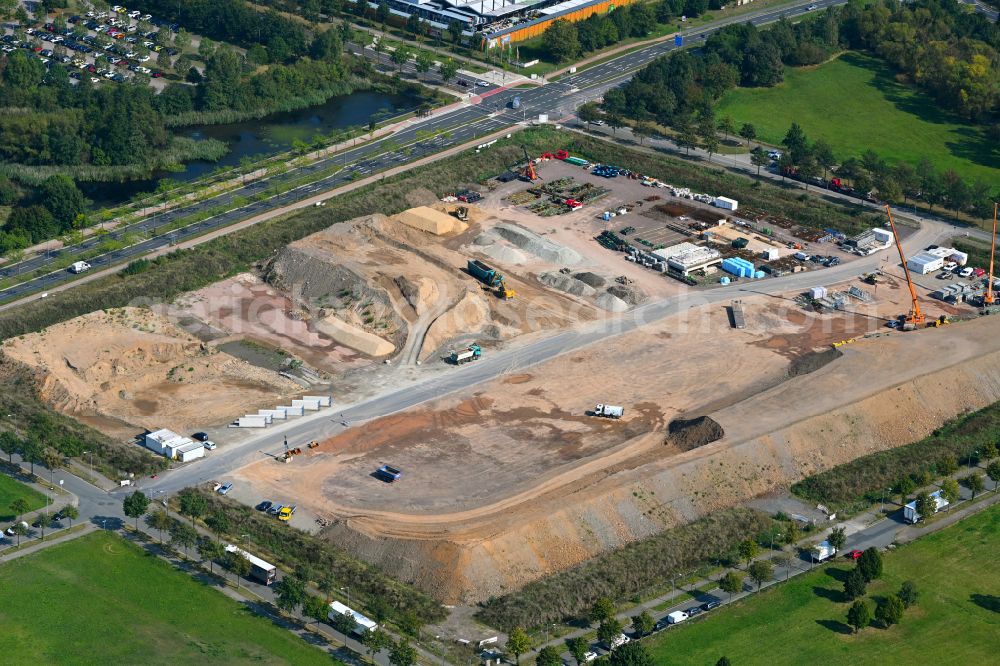 Dresden from the bird's eye view: Construction site with development works and embankments works on street Raehnitzer Allee - Wilschdorfer Landstrasse in the district Hellerau in Dresden in the state Saxony, Germany