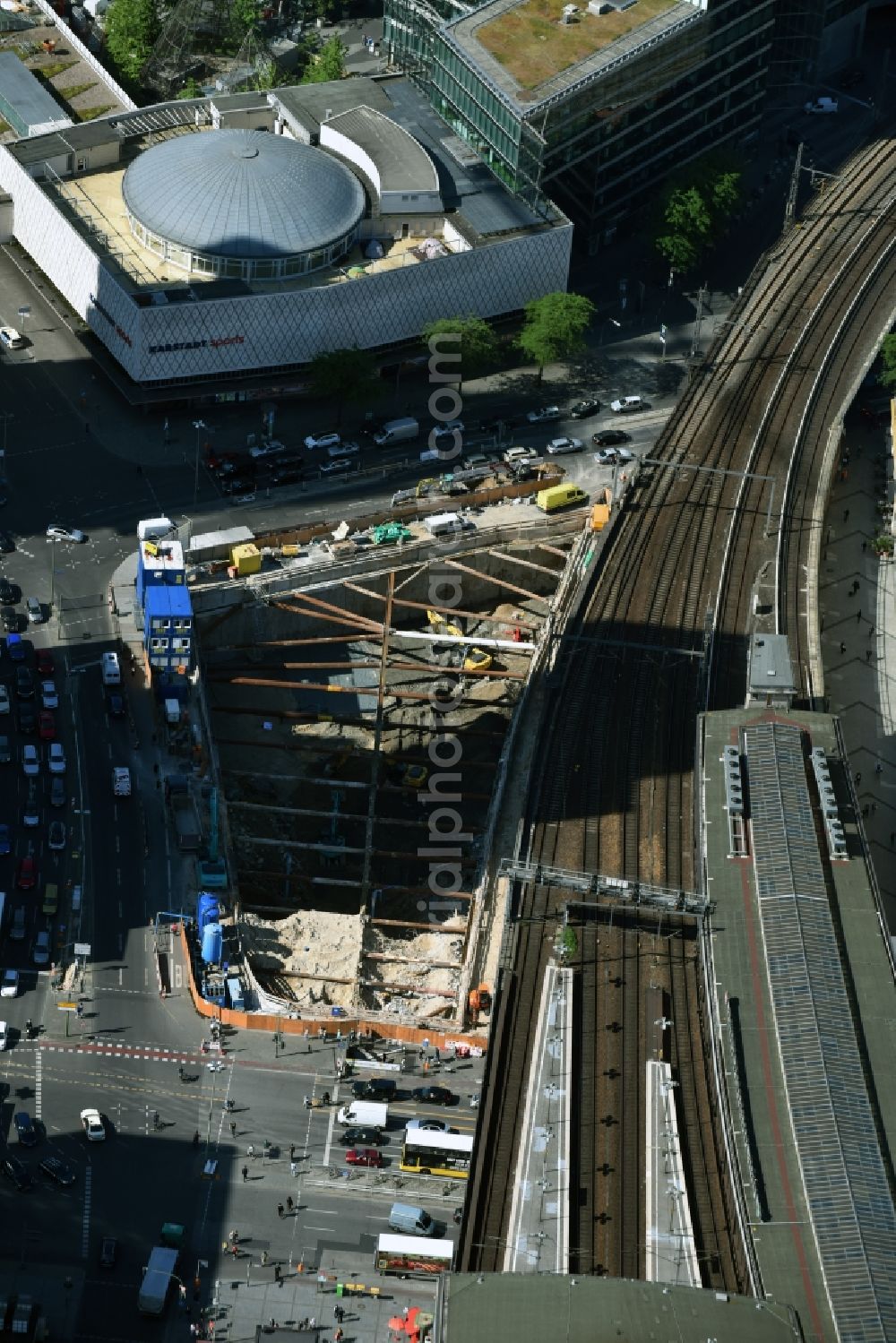 Berlin from the bird's eye view: Construction site with development works and embankments works of Porr Deutschland GmbH for a commercial building of Hines Interests Limited on Joachimstaler Strasse corner Hardenbergstrasse in Berlin