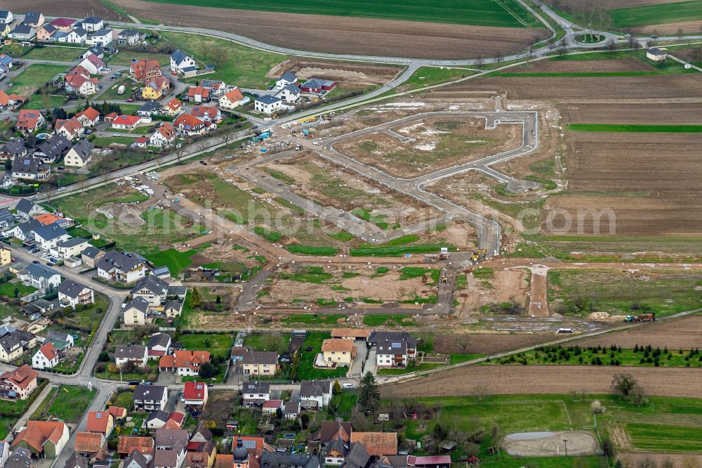 Aerial photograph Rheinhausen - Construction site with development works and embankments works fuer ein Wohn Baugebiet in Rheinhausen in the state Baden-Wurttemberg, Germany