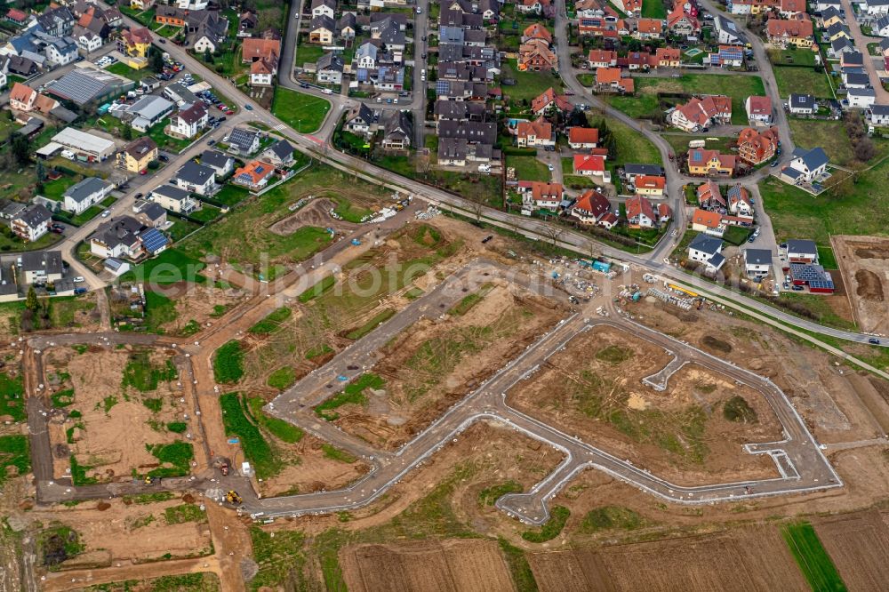 Rheinhausen from the bird's eye view: Construction site with development works and embankments works fuer ein Wohn Baugebiet in Rheinhausen in the state Baden-Wurttemberg, Germany