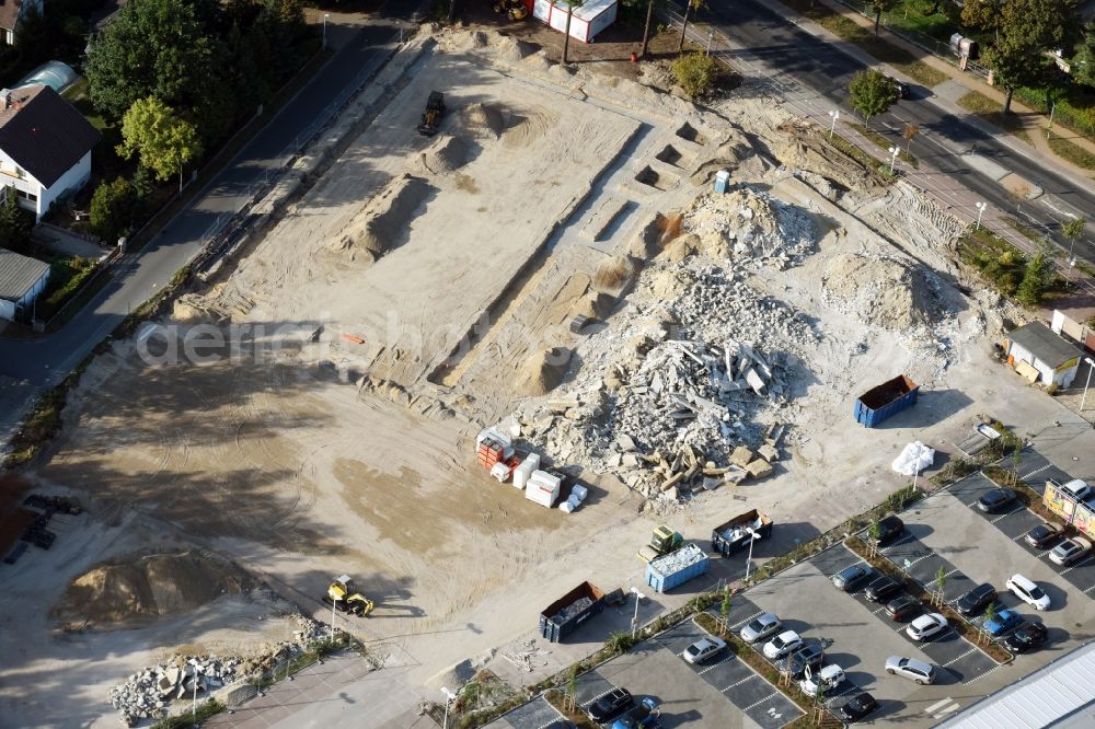 Hohen Neuendorf from above - Construction site of the GVG Projektentwicklungsgesellschaft mbH with development works and embankments works zur revitalisierung des Fachmarktzentrums HDZ at the Schoenfliesser Strasse in Hohen Neuendorf in the state Brandenburg