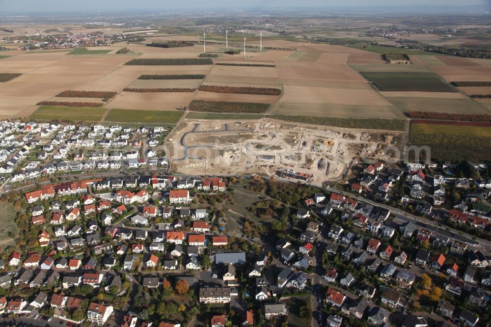 Nieder-Olm from the bird's eye view: Construction site with development, foundation, earth and landfill works for the construction area Weinberg V in Nieder-Olm in the state Rhineland-Palatinate, Germany