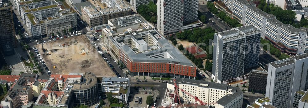 Berlin from above - Construction site with pile foundation work for the foundation plate of the new building Axel Springer Campus - OMA to Krausenstrasse - Schuetzenstrasse in Berlin