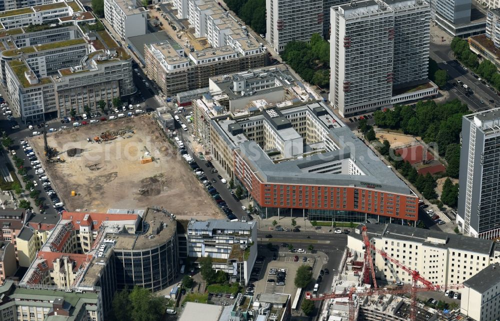 Berlin from the bird's eye view: Construction site with pile foundation work for the foundation plate of the new building Axel Springer Campus - OMA to Krausenstrasse - Schuetzenstrasse in Berlin