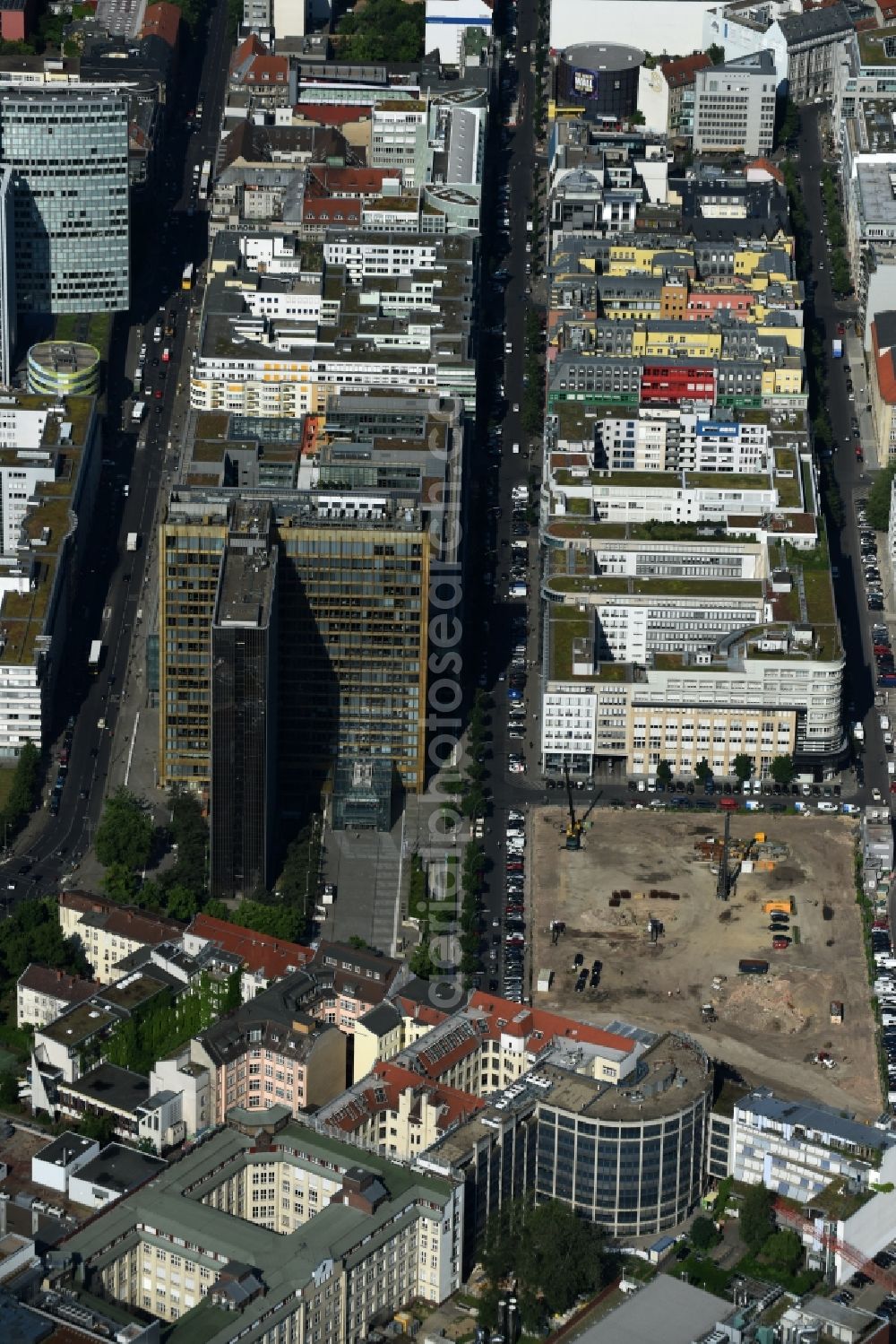 Aerial image Berlin - Construction site with pile foundation work for the foundation plate of the new building Axel Springer Campus - OMA to Krausenstrasse - Schuetzenstrasse in Berlin