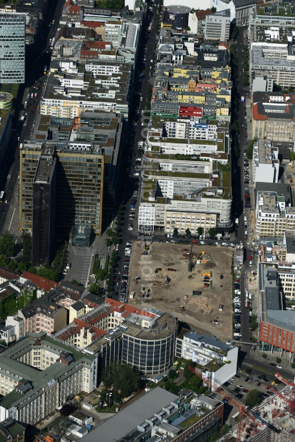 Aerial photograph Berlin - Construction site with pile foundation work for the foundation plate of the new building Axel Springer Campus - OMA to Krausenstrasse - Schuetzenstrasse in Berlin