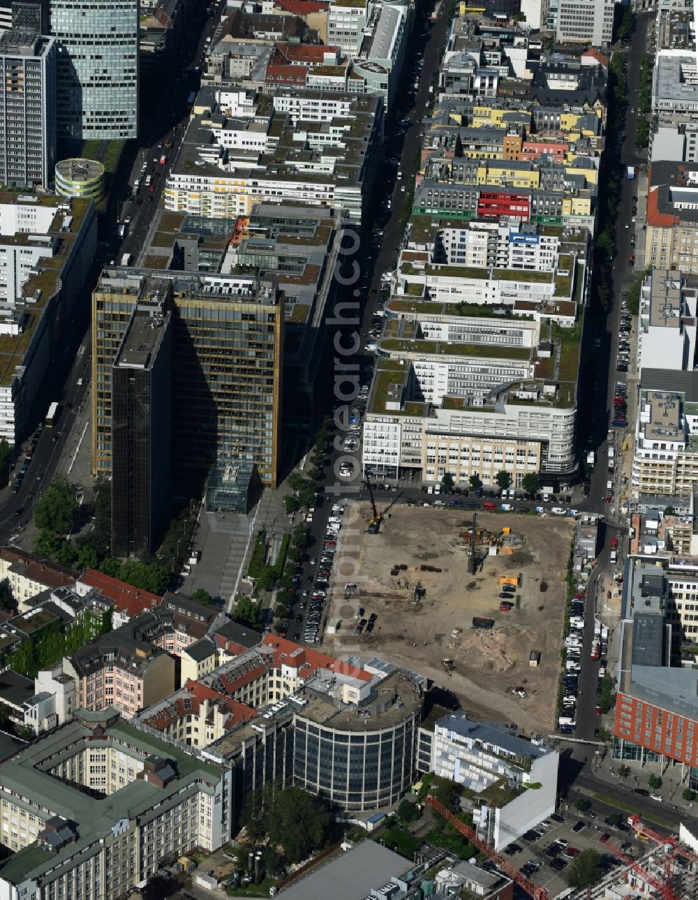 Berlin from above - Construction site with pile foundation work for the foundation plate of the new building Axel Springer Campus - OMA to Krausenstrasse - Schuetzenstrasse in Berlin