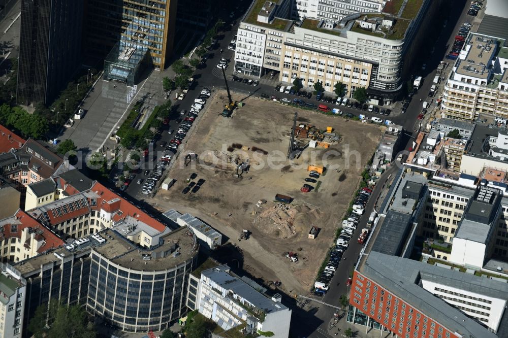 Berlin from the bird's eye view: Construction site with pile foundation work for the foundation plate of the new building Axel Springer Campus - OMA to Krausenstrasse - Schuetzenstrasse in Berlin