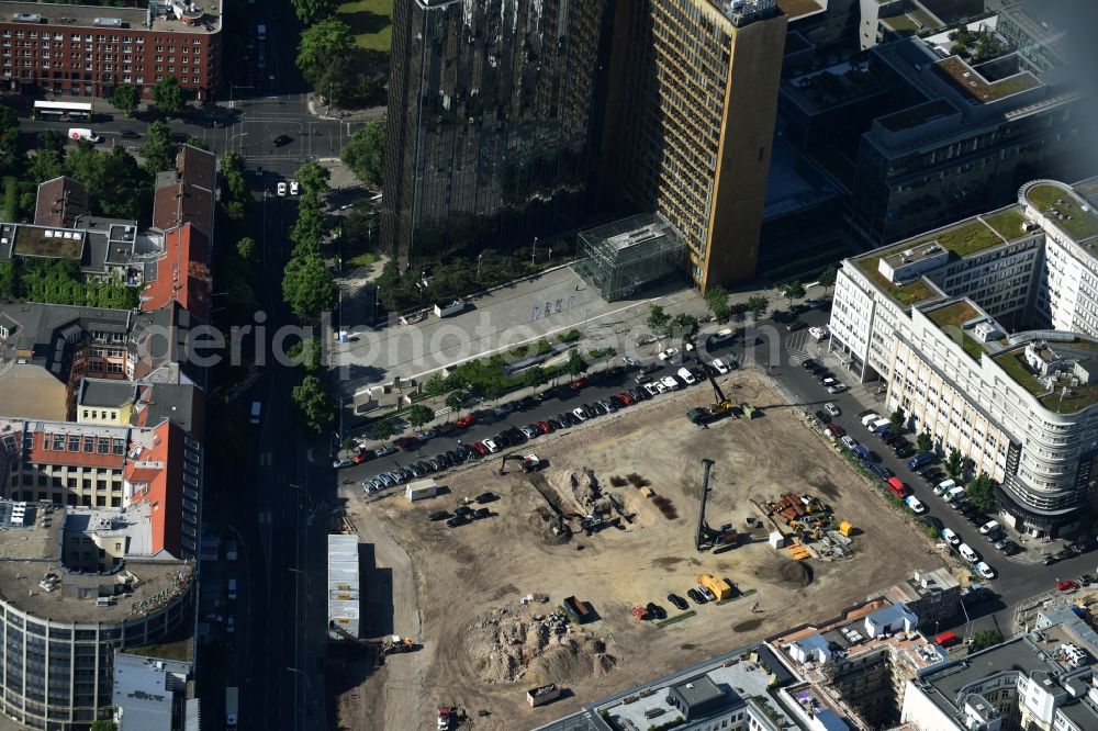 Aerial photograph Berlin - Construction site with pile foundation work for the foundation plate of the new building Axel Springer Campus - OMA to Krausenstrasse - Schuetzenstrasse in Berlin