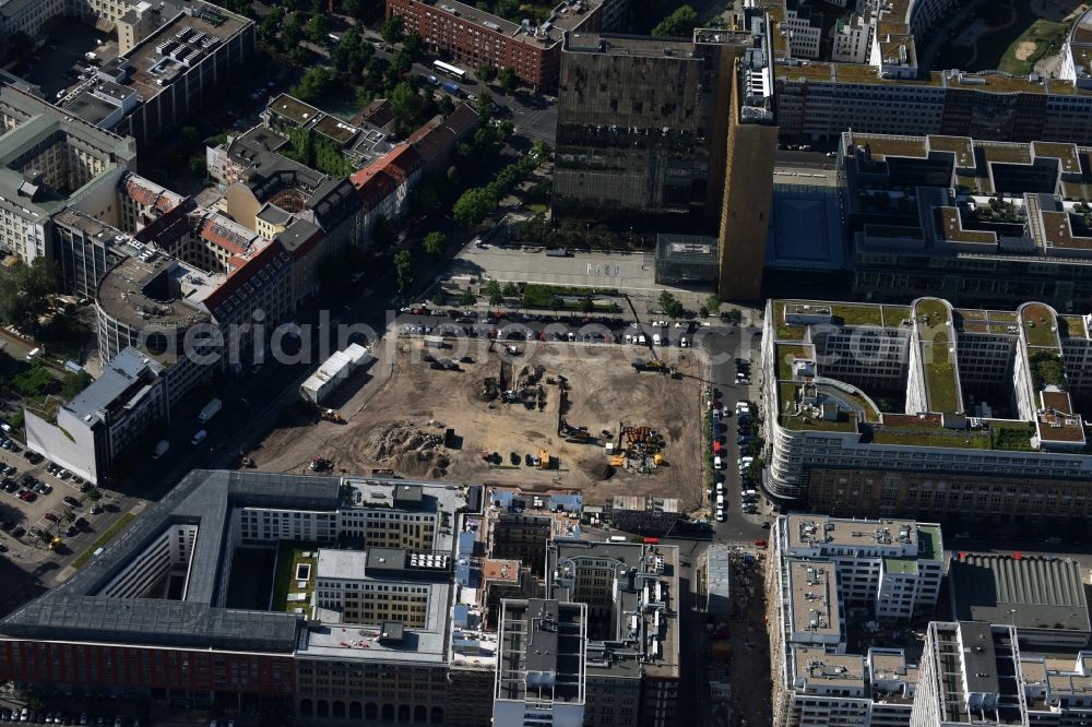 Berlin from the bird's eye view: Construction site with pile foundation work for the foundation plate of the new building Axel Springer Campus - OMA to Krausenstrasse - Schuetzenstrasse in Berlin