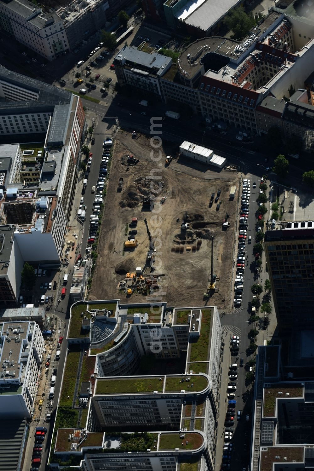 Berlin from above - Construction site with pile foundation work for the foundation plate of the new building Axel Springer Campus - OMA to Krausenstrasse - Schuetzenstrasse in Berlin