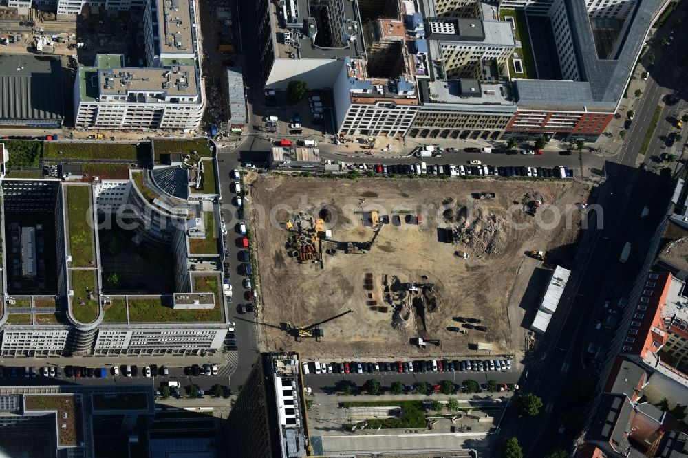 Berlin from above - Construction site with pile foundation work for the foundation plate of the new building Axel Springer Campus - OMA to Krausenstrasse - Schuetzenstrasse in Berlin