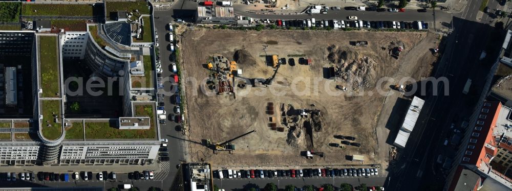 Berlin from the bird's eye view: Construction site with pile foundation work for the foundation plate of the new building Axel Springer Campus - OMA to Krausenstrasse - Schuetzenstrasse in Berlin