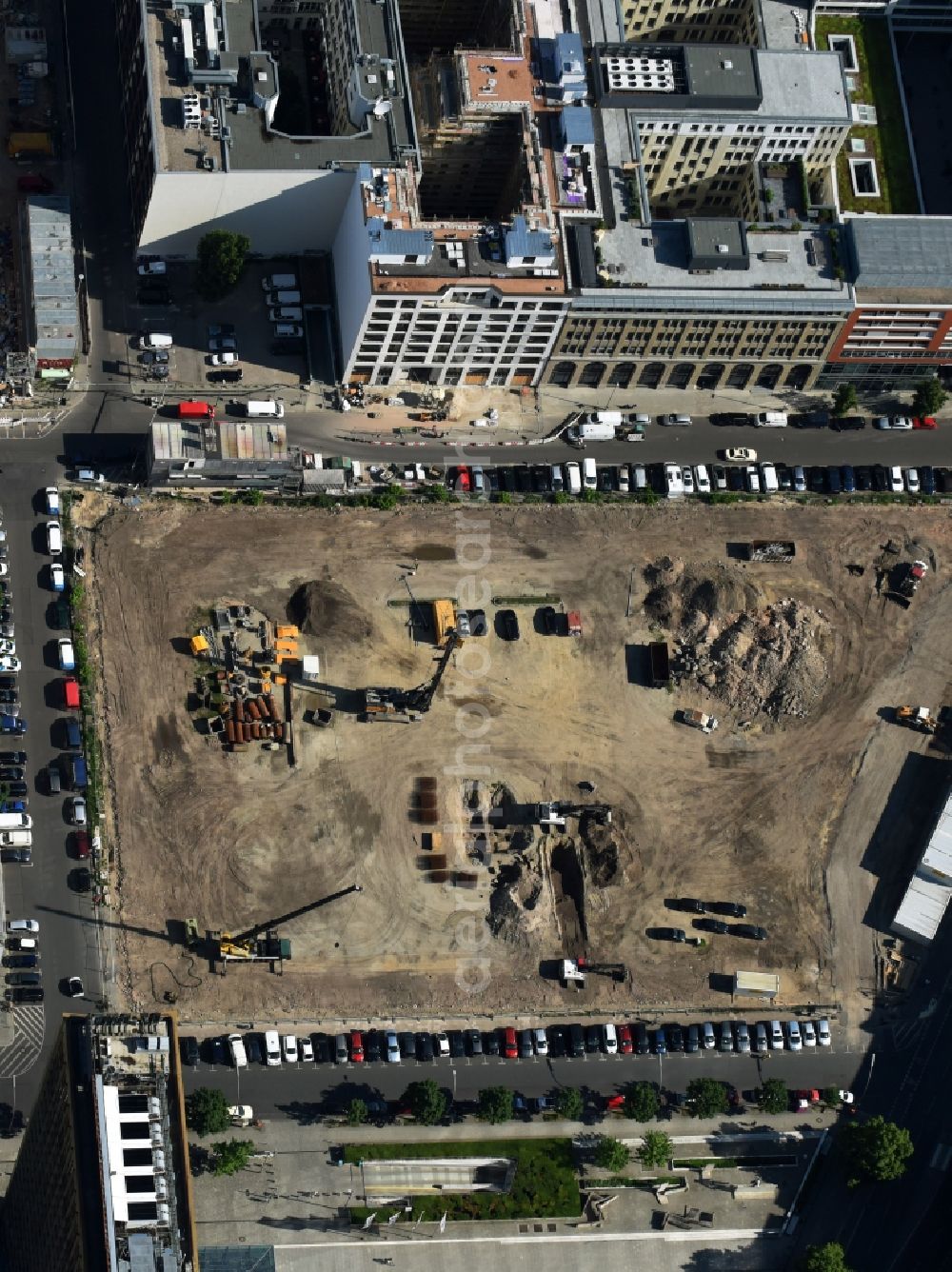 Aerial image Berlin - Construction site with pile foundation work for the foundation plate of the new building Axel Springer Campus - OMA to Krausenstrasse - Schuetzenstrasse in Berlin