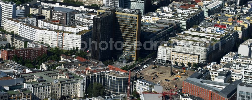 Berlin from above - Construction site with pile foundation work for the foundation plate of the new building Axel Springer Campus - OMA to Krausenstrasse - Schuetzenstrasse in Berlin