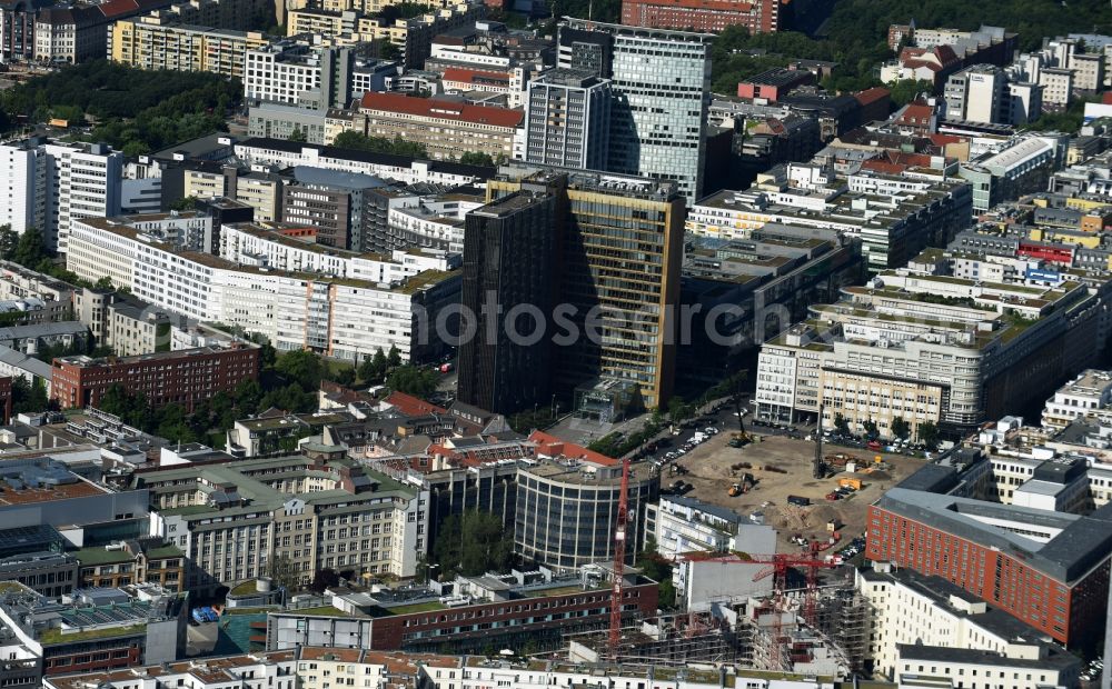 Berlin from the bird's eye view: Construction site with pile foundation work for the foundation plate of the new building Axel Springer Campus - OMA to Krausenstrasse - Schuetzenstrasse in Berlin