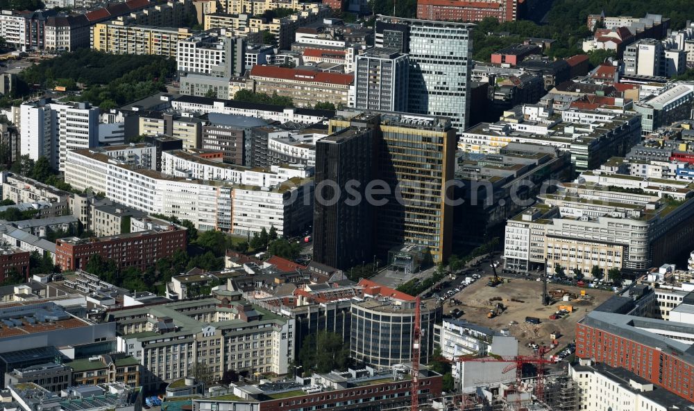 Aerial image Berlin - Construction site with pile foundation work for the foundation plate of the new building Axel Springer Campus - OMA to Krausenstrasse - Schuetzenstrasse in Berlin