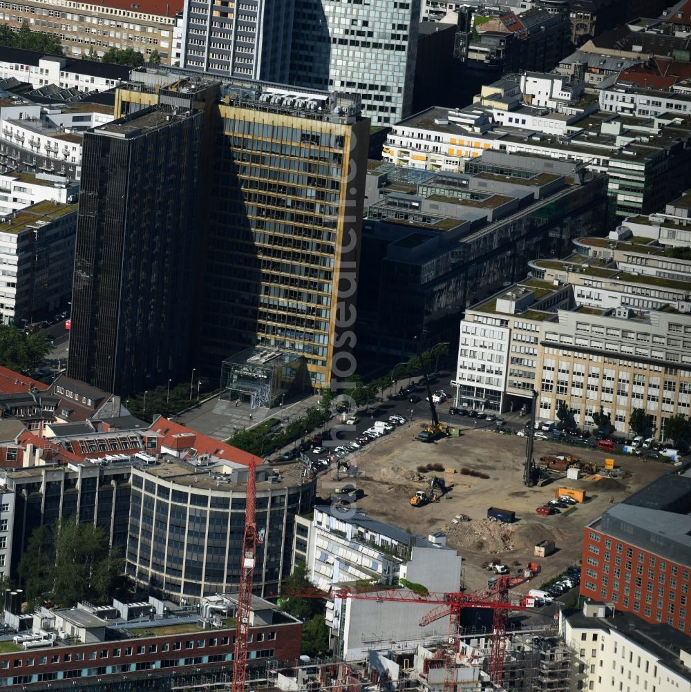 Aerial photograph Berlin - Construction site with pile foundation work for the foundation plate of the new building Axel Springer Campus - OMA to Krausenstrasse - Schuetzenstrasse in Berlin