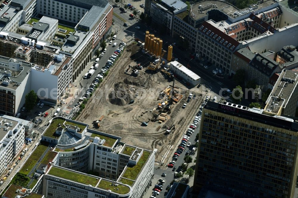 Berlin from above - Construction site with pile foundation work for the foundation plate of the new building Axel Springer Campus - OMA to Krausenstrasse - Schuetzenstrasse in Berlin