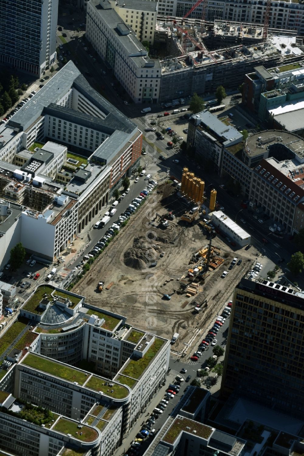 Aerial image Berlin - Construction site with pile foundation work for the foundation plate of the new building Axel Springer Campus - OMA to Krausenstrasse - Schuetzenstrasse in Berlin