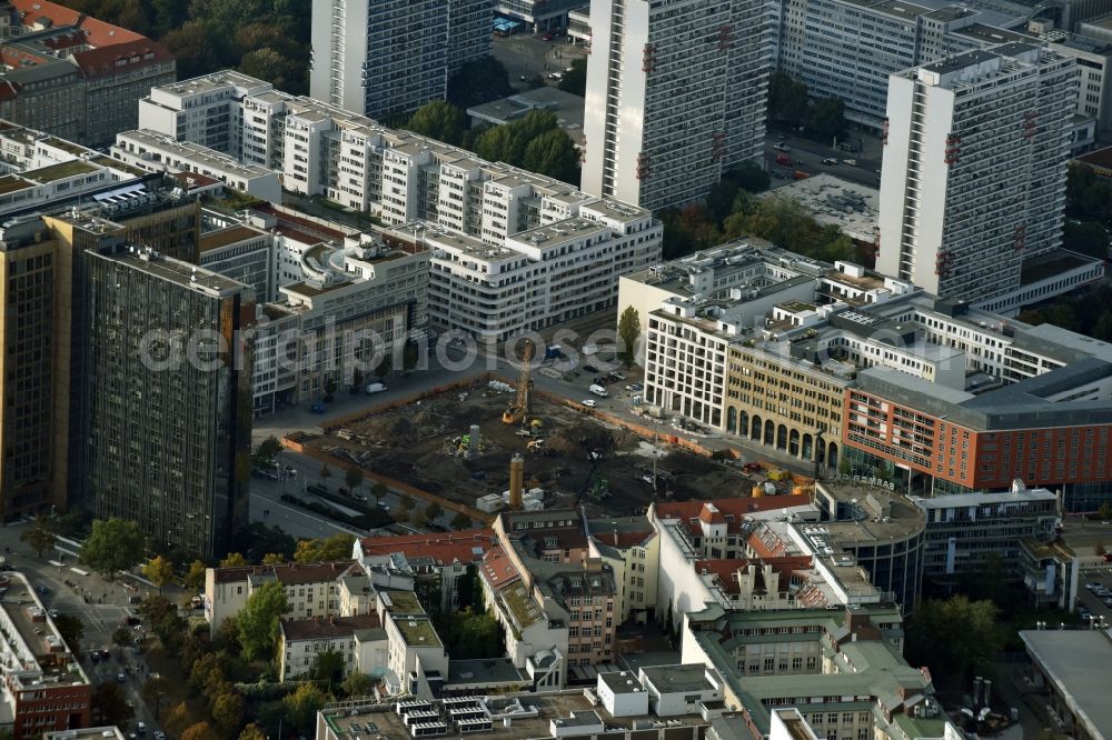 Aerial image Berlin - Construction site with pile foundation work for the foundation plate of the new building Axel Springer Campus - OMA to Krausenstrasse - Schuetzenstrasse in Berlin