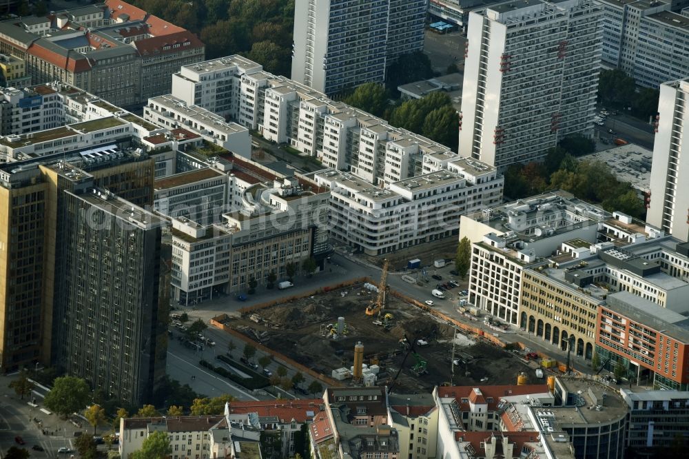 Aerial photograph Berlin - Construction site with pile foundation work for the foundation plate of the new building Axel Springer Campus - OMA to Krausenstrasse - Schuetzenstrasse in Berlin