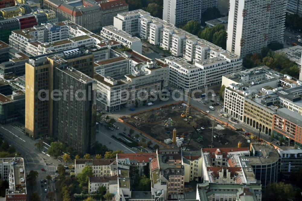 Berlin from above - Construction site with pile foundation work for the foundation plate of the new building Axel Springer Campus - OMA to Krausenstrasse - Schuetzenstrasse in Berlin