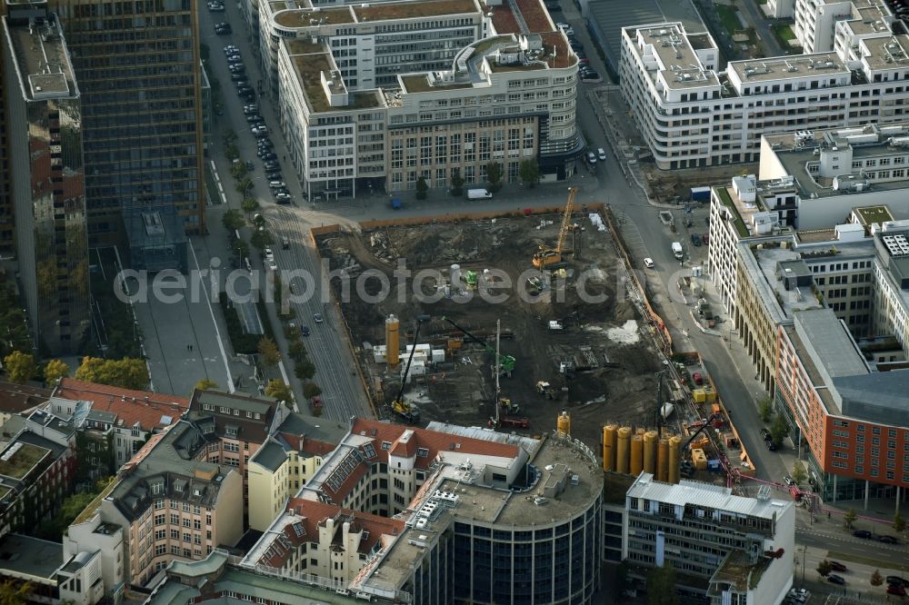 Berlin from the bird's eye view: Construction site with pile foundation work for the foundation plate of the new building Axel Springer Campus - OMA to Krausenstrasse - Schuetzenstrasse in Berlin